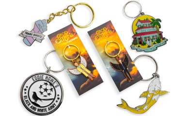 A collection of custom keyrings that you can use for inspiration to create your own products. They are football keychains, a koi carp keyring, trans rights keying, illustrated keychain, and two promotional keyrings for the tv show Good Omens.