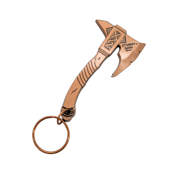 A bronze-plated bespoke bottle opener keyring in the shape of a viking's axe.