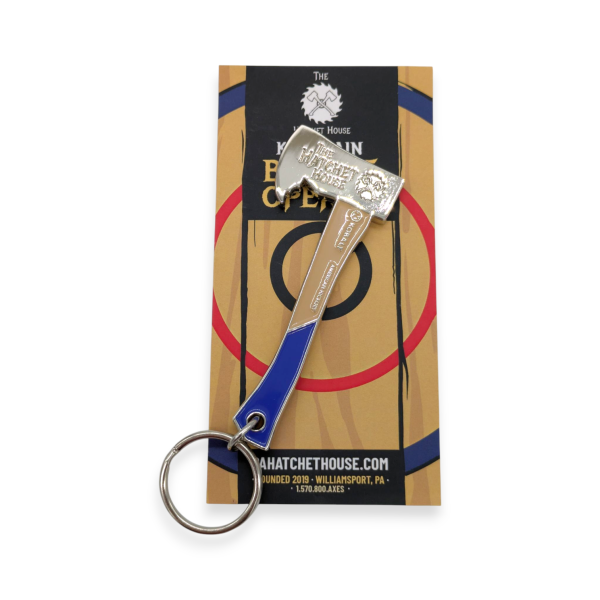 A axe shaped promotional bottle opener keyring with backing card with a target on it.