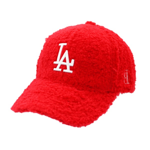 A red teddy material custom baseball hat with a white embroidered LA logo.