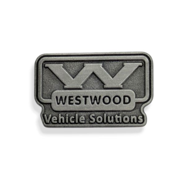 A promotional die struck lapel pin with a company logo on the front.