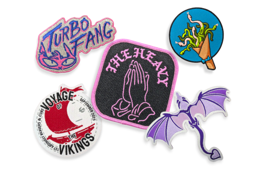 A collection of five custom patches showcasing the difference between overlocked and heat-cut edges.