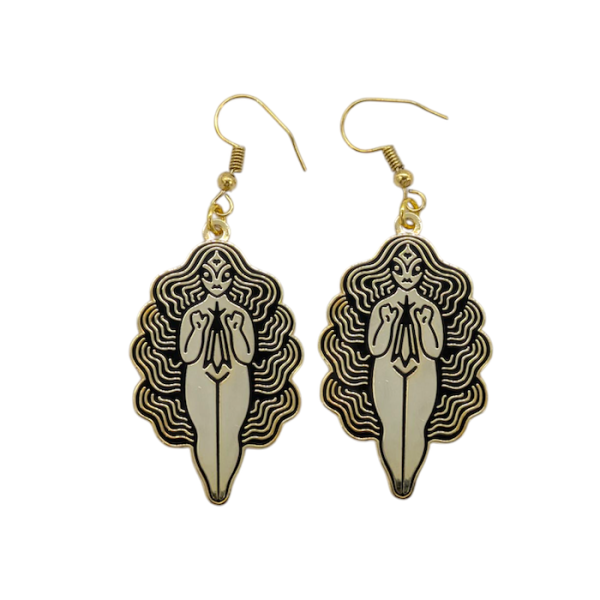 A pair of gold-plated bespoke enamel dangle earrings featuring a naked woman design with long flowing wavy hair.