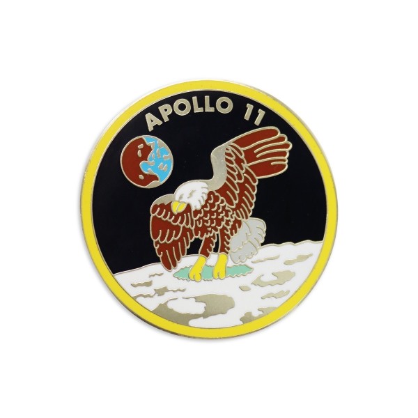 A double sided enamel challenge coin celebrating the Apollo 11 moon landing with logo.