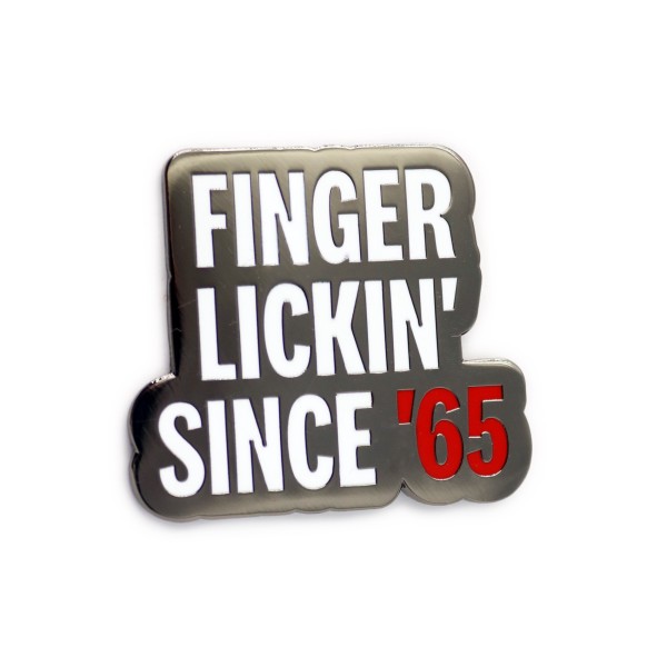 A hard enamel branding pin badge for KFC that says