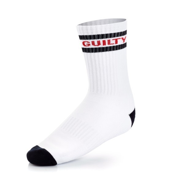 White custom sports sock with black details and bold red GUILTY text, showcasing premium custom knitted athletic socks for branded merch.