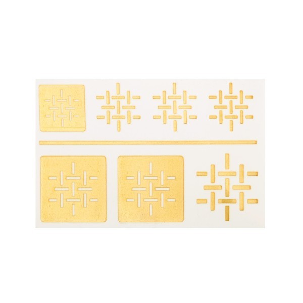 Sheet of gold geometric custom metallic temporary tattoos, featuring squares and pattern motifs ready for promotional foil tattoo use.