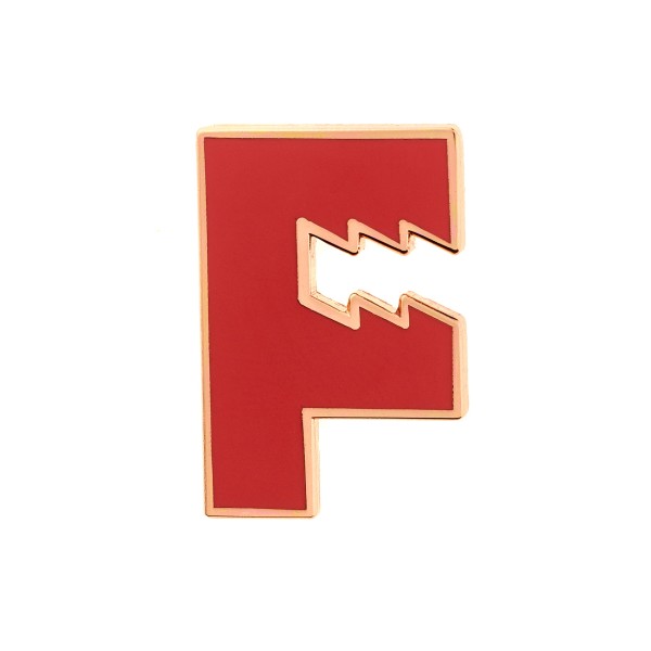 A hard enamel pin of a big red