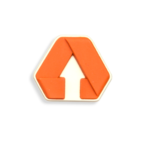 A soft PVC lapel pin badge with the red recycling logo on the front.