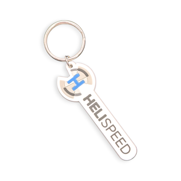 A long and thin rubber keychain with a helicopter landing pad and the word