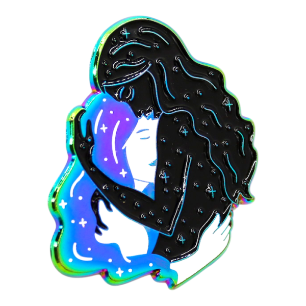 A sweet pin badge of two long-haired people cuddling, the rainbow plating gives the badge a beautiful effect.