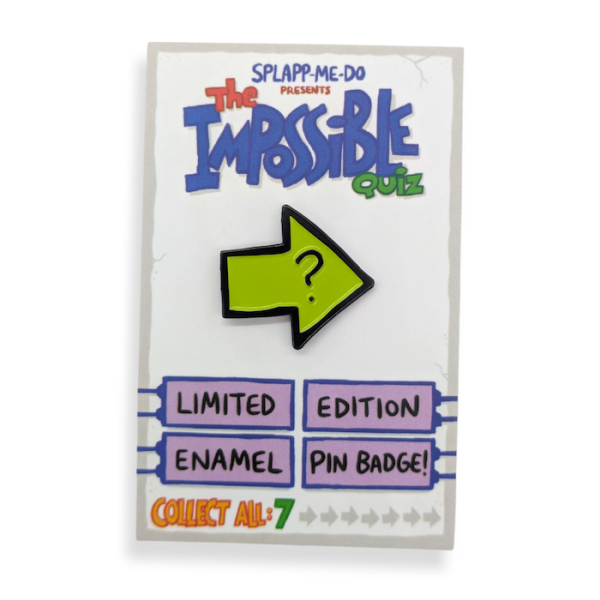 An arrow soft enamel lapel pin from the The Impossible Quiz. The Arrow is yellow with a black outline and has a question mark in the middle. The lapel pin is attatched to a branded backing card.