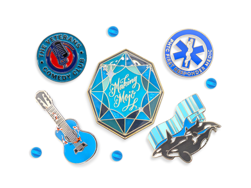 A collection of five pin badges that have blue hues to make a very appealing image.